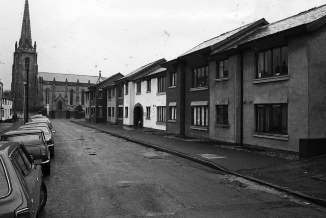This photo from 1979 shows cottages on the west side of Church Street. Those on the east side were replaced by sheltered accommodation. St Michael's Church remains in the distance, unchanged  over the centuries.