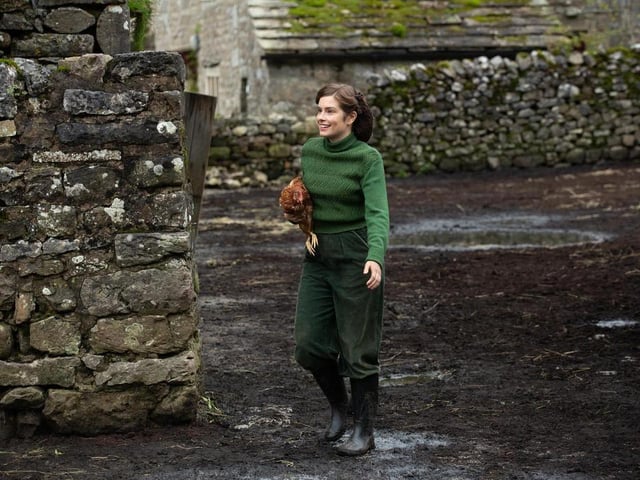 A vision in country green, farmer's daughter Helen Alderson (Rachel Shenton) wears corduroy trousers for her first appearance.