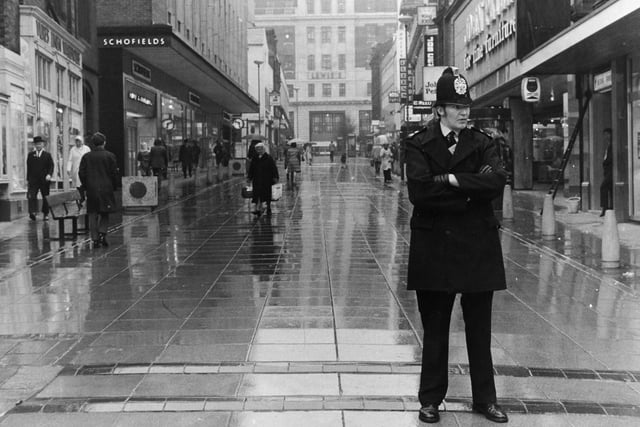April 1973 and a policeman stands at the Lands Lane entrance to Leeds city centre precinct to enforce a total ban on traffic.