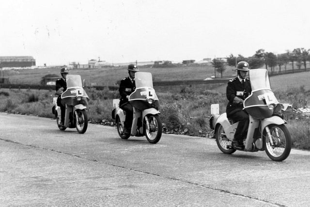 Members of Leeds City Police riding motorcycles for the first time on a private road at the Carlton Motoring Instruction Centre in Yeadon.