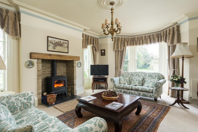 The fire is the focal point of the sitting room