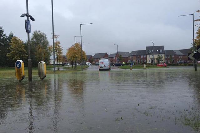 20mm of rain has reportedly fallen in the last three hours, causing river levels to reach "flood warning levels".