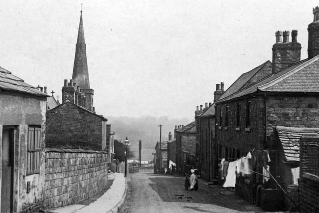 Church Street looking north-east from the junction with Highfield Lane. On the left can be seen the spire of All Saint's Church, and just uphill from it, the Tow Pointers Inn. Undated.