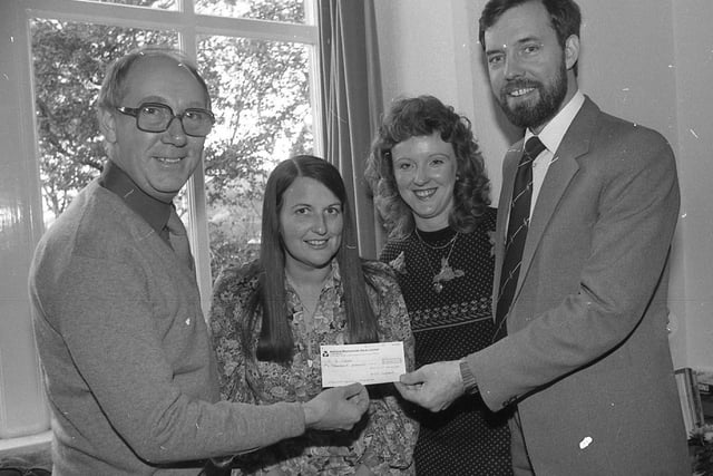Bob Greaves (left), Granada TV presenter, receives a cheque for £10,000 for the Wyre Special Nursing Centre fund, raised by Wendy Elliott (second from left). Also pictured are chairman of the fund Dr David Cooper and Mrs Jane Jordan, appeals officer. Since June Mrs Elliott, a cancer victim, has raised £20,000 towards a nursing home for the incurably ill at Bispham, Blackpool