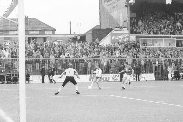 John Sheridan fires towards goal at Boundary Park in the play-off semi-final second leg in May 1987. A Keith Edwards strike was enough to see the Whites through on the away goals rule.