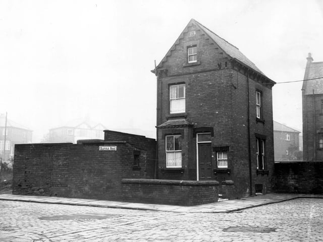 Oldfield Grove in December 1972 featuring a large detached property with a small private front garden. On the left is Oldfield Road and on the right is the entrance to Oldfield Crescent.