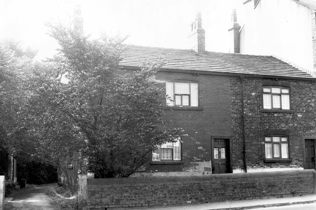 The front entrance and garden of number 189 Tong Road, a through terraced property in September 1972. On the left is an access road to the rear of the properties.
