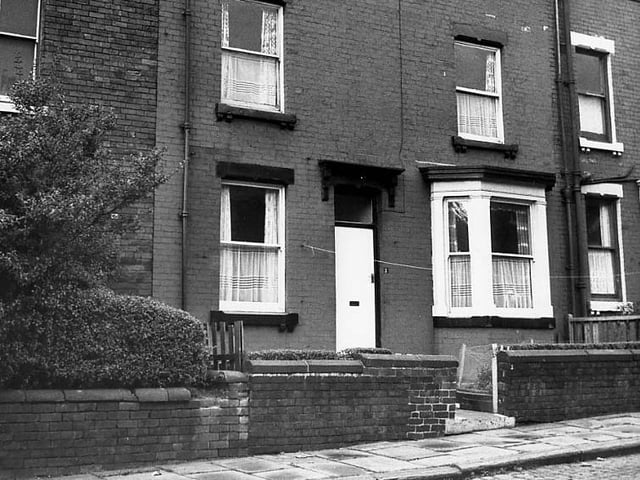 Sixteenth Avenue in October 1971. This is a back-to-back property with a small garden and a bay window. Brickwork has been painted.