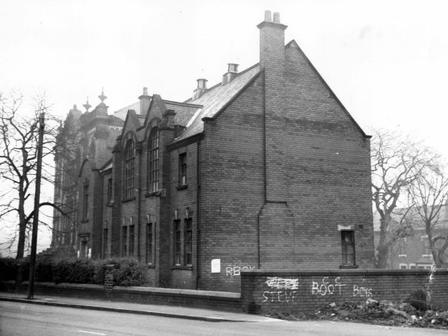 This photo from December 1972 shows a side view of a large building with broken windows once the premises of the Boy's Brigade (27th Leeds Company).