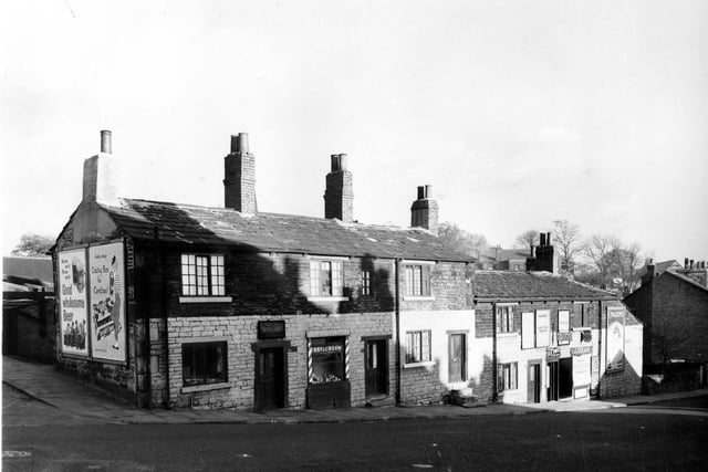 Taken around 1955, prior to clearance programme in this area. On the left is the junction with the Village Street.