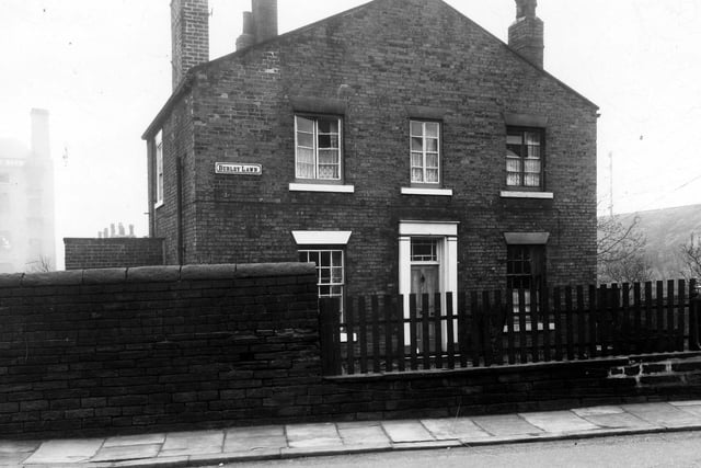 This house was called Burley Lawn pictured in December 1959. In the background part of the old Willow Brewery can be seen. To the right the embankment for the Leeds - Harrogate railway line.
