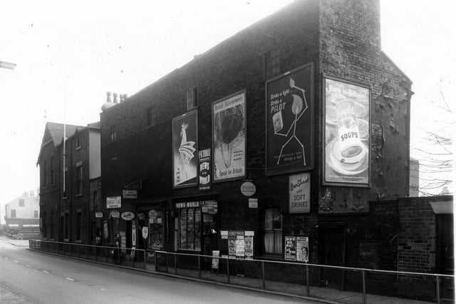 October 1959. On the left, at the corner with Roberts Place is Burley Liberal Club. Moving right is a tobacconists shop then a newsagents, business of L and B Terrill.