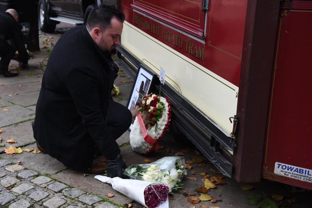 Friends and family lay flowers and wreaths at Keith Roberts' Guild Tram outside the Harris Museum in Flag Market, Preston this morning (Tuesday, October 13)