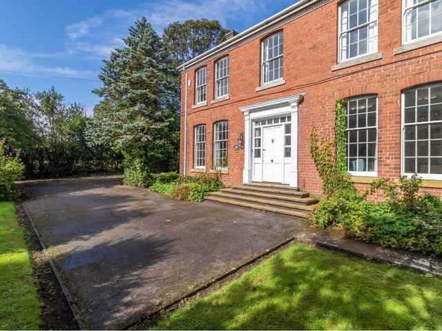 Yew Court is approached by a long driveway