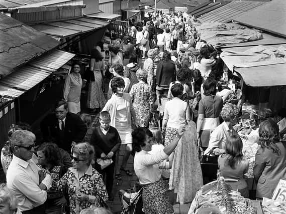 The days of busy stalls at Ashton market in 1972