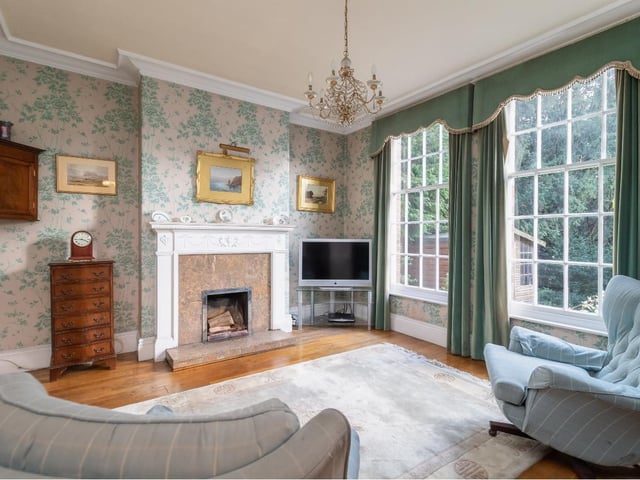 Sitting room complete with chandelier