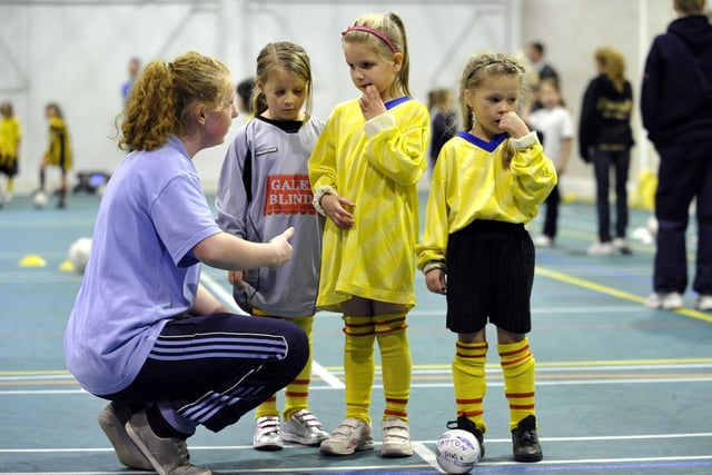 Girls’ Brazilian-style football for year two starters indoors at Bramcote School sports hall.