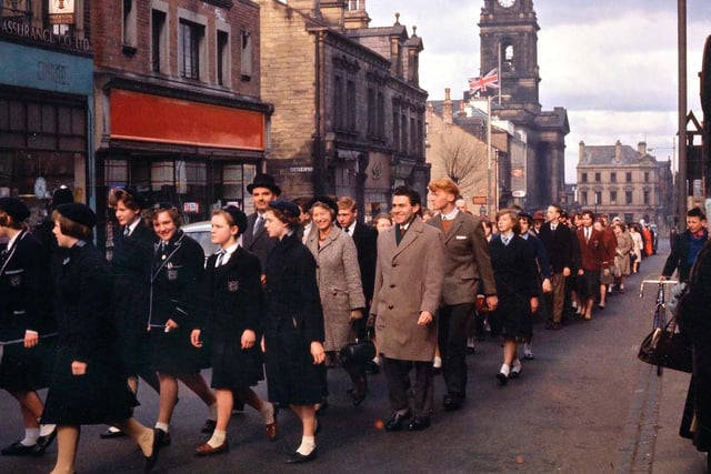 School contingents are seen here in the procession to visit the Queen Street Wesleyan Chapel (later to become Morley Central Methodist Church) for a service of thanksgiving for Morley's 75 years as a Borough.
