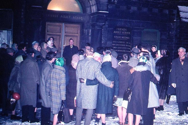 Members of the Morley Friends' Adult School singing outside their premises just before 12 o'clock midnight and the change over to the New Year.