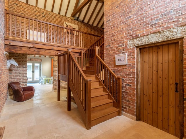 The exposed brickwork and wood complement each other perfectly
