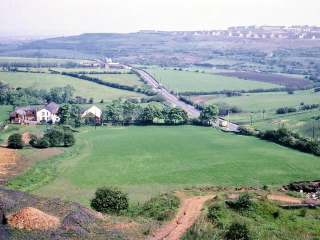 The A653T Leeds to Dewsbury Road between Tingley roundabout and the junction with Wide Lane. The photo was taken from the northern edge of Topcliffe Colliery spoil heap.