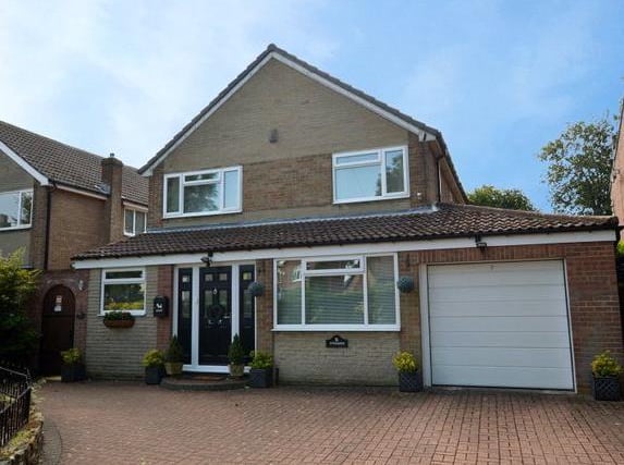 This Uppermoor home is close to the local schools and has four bedrooms, three reception rooms and a gated driveway.