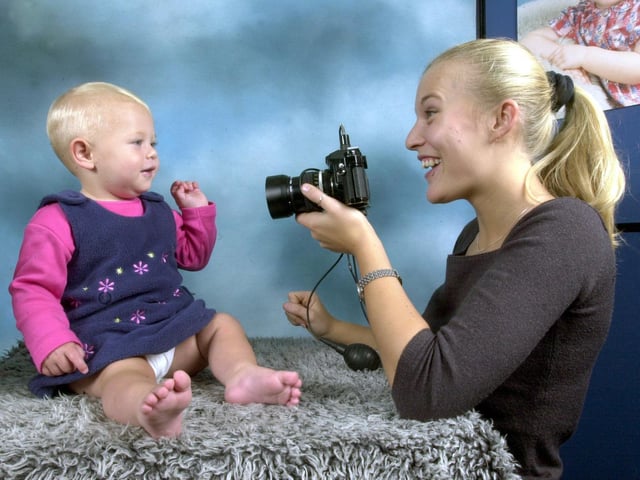 The Headrow Centre hosted a baby competition. Pictured is one-year-old Angel Tia Parker from Wortley being photographed by Becky Lea.