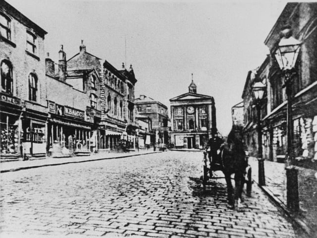 The forerunner to the Corn Exchange was this building located on Briggate, just north of the junction with The Headrow. It was built by Samuel Chapman and cost £12,500. It was demolished in 1869.