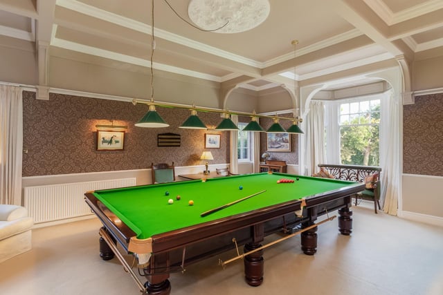 The billiard room is popular with both young and old.
