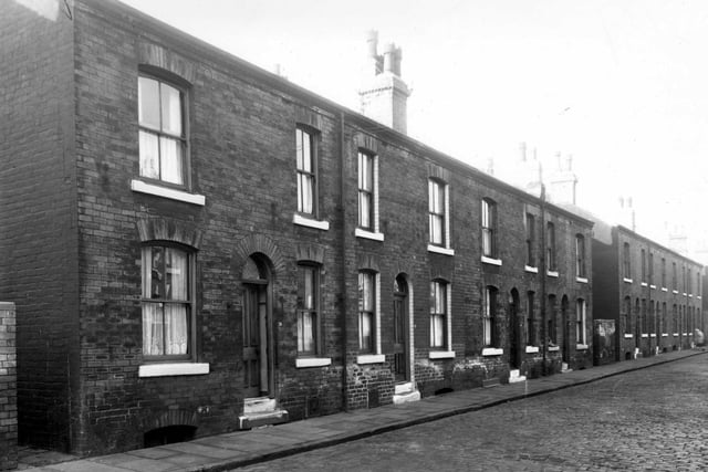 Four double fronted back-to-back terraced houses on Addington Street in February 1959 ahead of demolition.