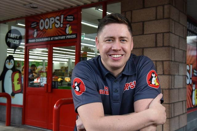 Store Manager Stuart Pritchard of Oops! Food Clearance Store prepares for its grand opening in Preston