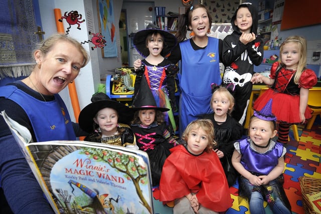 Hallowe’en fun at Headstart Day Nursery , scary story with staff Lynn Johnson and Danila McLellan and children.