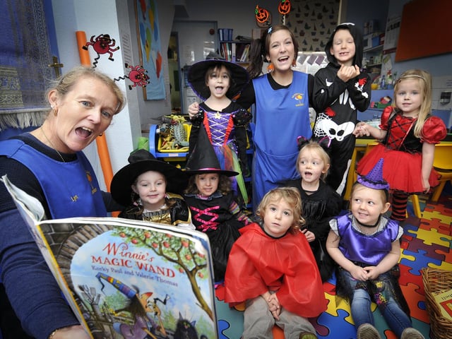 Hallowe’en fun at Headstart Day Nursery , scary story with staff Lynn Johnson and Danila McLellan and children.