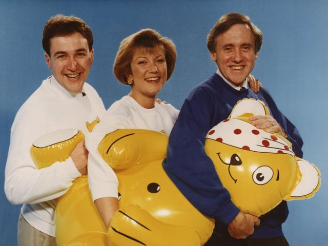 Children In Need 1991. Harry with presenters Jon Hammond and Sue Wilkins with Pudsey Bear