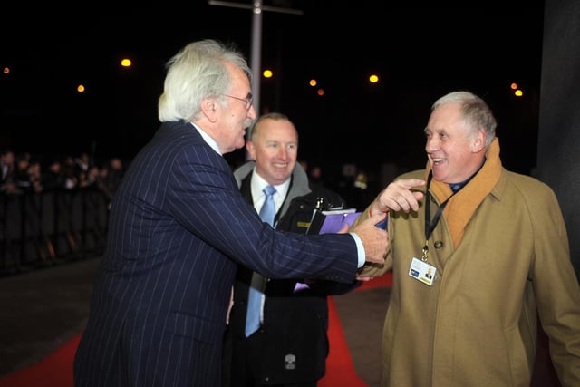 BBC Sports Personality of The Year 2009 held at Sheffield Arena. Des Lynam shares a joke with Harry Gration while arriving on the red carpet.