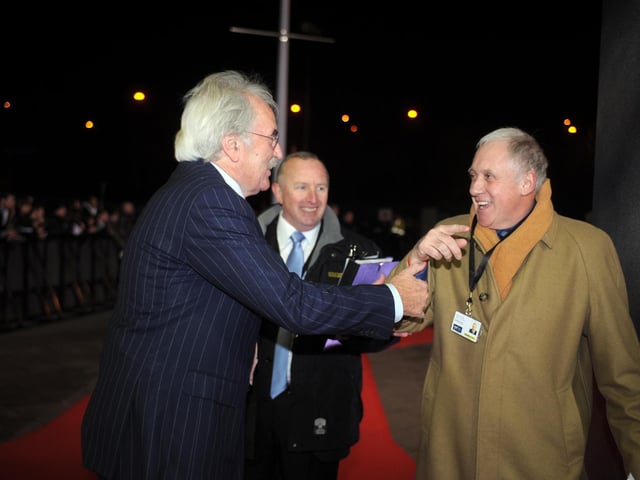 BBC Sports Personality of The Year 2009 held at Sheffield Arena. Des Lynam shares a joke with Harry Gration while arriving on the red carpet.