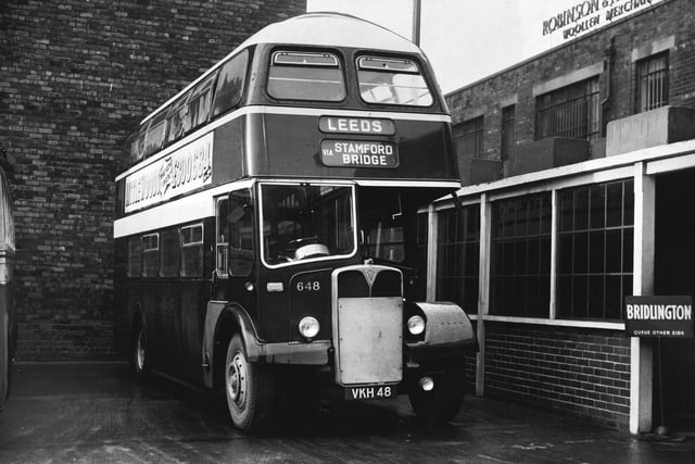 A VKH 48 Leeds bus outside wool merchants Robinson and Fallows in November 1959.