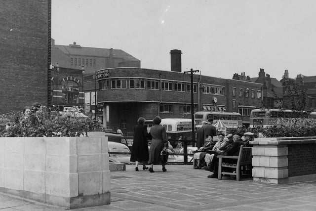 June 1959 and the Garden of Rest at Eastgate in the city centre with Leeds Bus Station in the background.