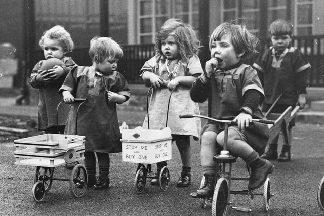 Children in the playground of the new nursery school at Castleford, Yorkshire, opened as an experiment by the West Riding Committee. The school catered for 80 children, between the ages of 2 and 4.