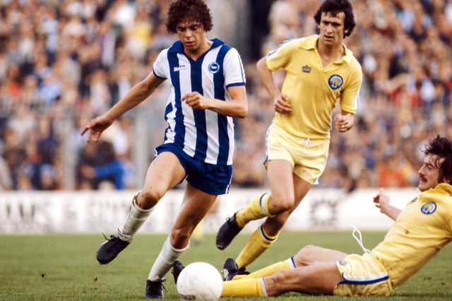 Leeds United's Peter Hampton tries to tackle Brighton's Peter Ward during the league game at the Goldstone Ground in October 1979. The game finished goalless.