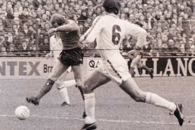 Paul Madeley is powerless to stop Bolton's Neil Whatmore scoring at Elland Road in February 1980.