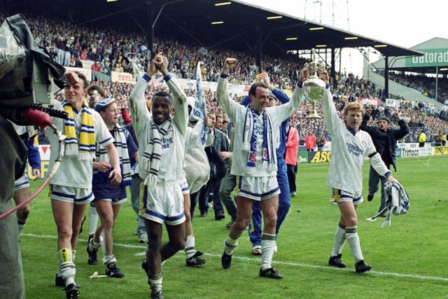 Gary McAllister and his Leeds United team-mates parade the First Division trophy around Elland Road after beating Manchester United to the title.