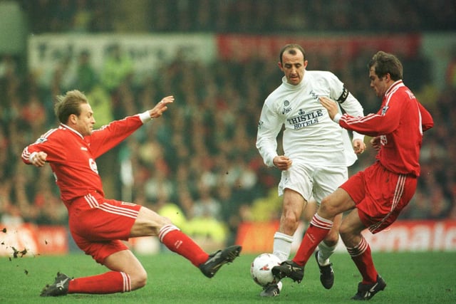 Gary McAllister takes on the Liverpool defence during the Leeds United v Liverpool FA Cup quarter final match at Elland Road.