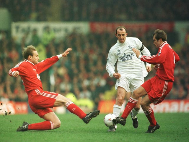 Gary McAllister takes on the Liverpool defence during the Leeds United v Liverpool FA Cup quarter final match at Elland Road.