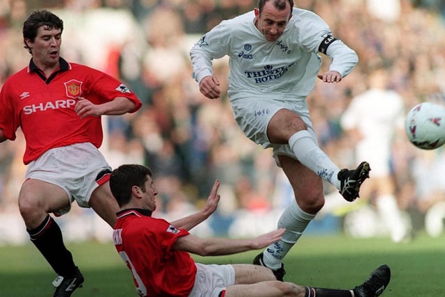 Gary McAllister takes on Manchester United and Roy Keane (left) in a fierce rivalry clash.