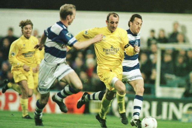 Gary McAllister of Leeds attacks the Queens Park Rangers defence during a Premiership game at Loftus Road in London.