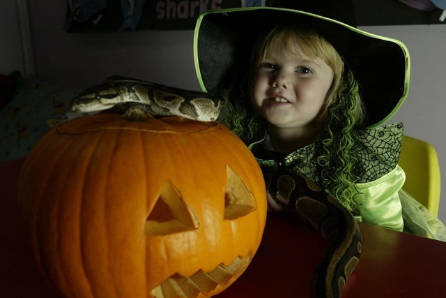 Natalie Housecroft with a snake at the Triangle House Day Nursery Halloween party in 2004.