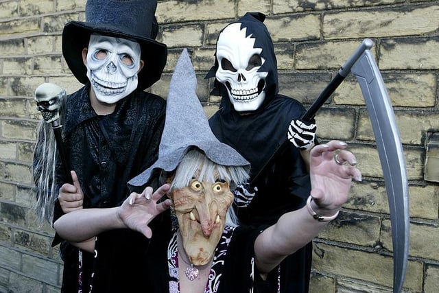 Leander Stones is pictured with Laurence Waterhouse, 9, and his brother, Sebastian, 8, in their Halloween outfits back in 2006.