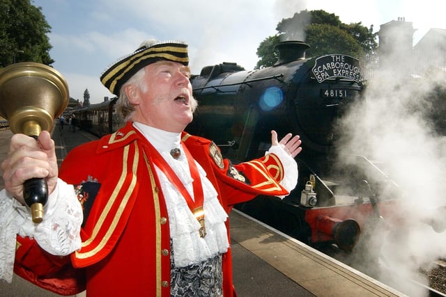 Signalling the departure of the Scarborough Spa Express steam loco for its first run of the 2003 season