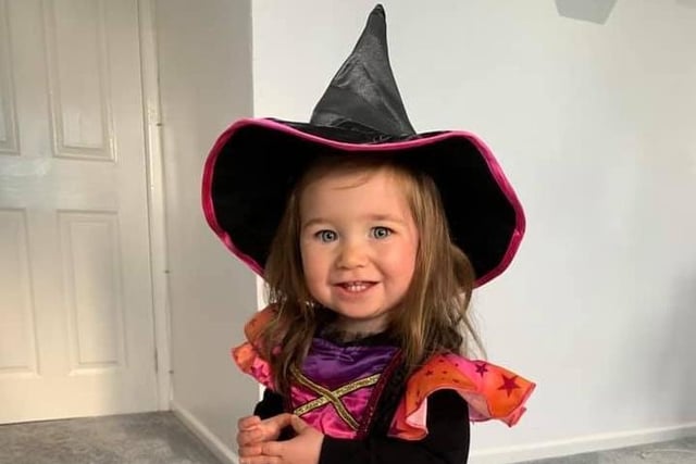 Ava Digger, who is 23 months old, as a little witch